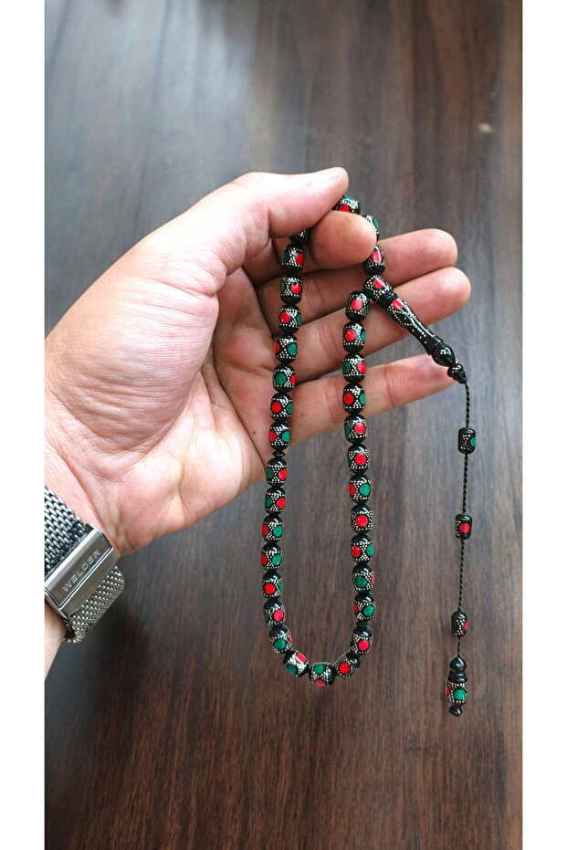 سبحة كوكا مصنوعة من المينا والفضة المزخرفة على شكل كبسولة