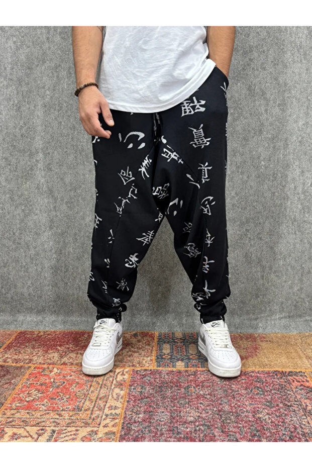 بنطلون شالوار منقوش بخصر مطاطي - 1