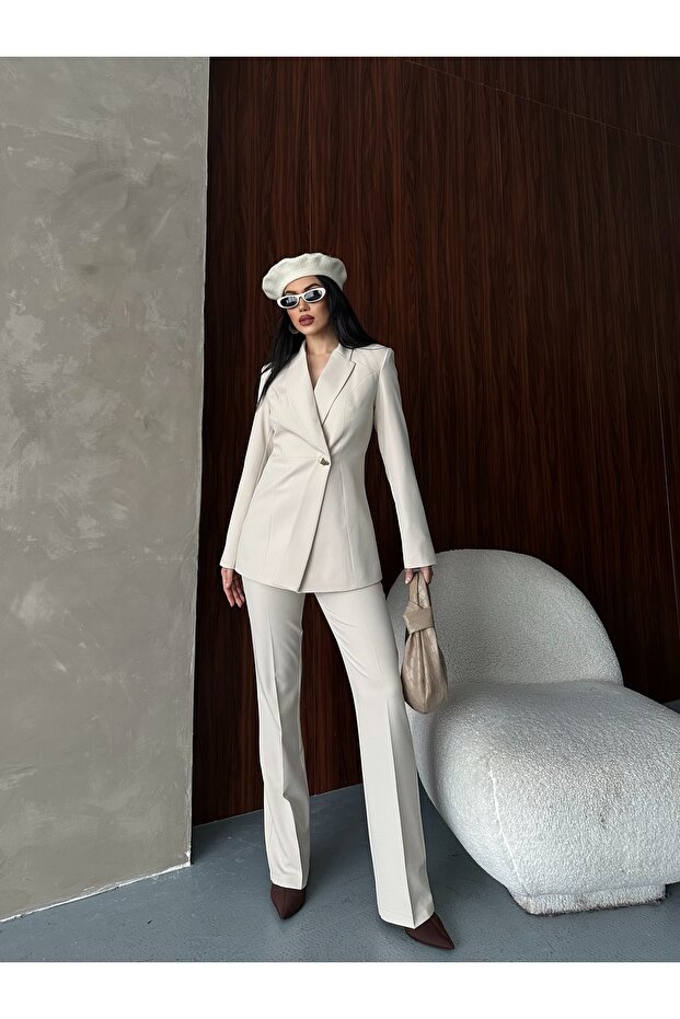 طقم بنطلون وسترة غير متماثلة بزر واحد - 5