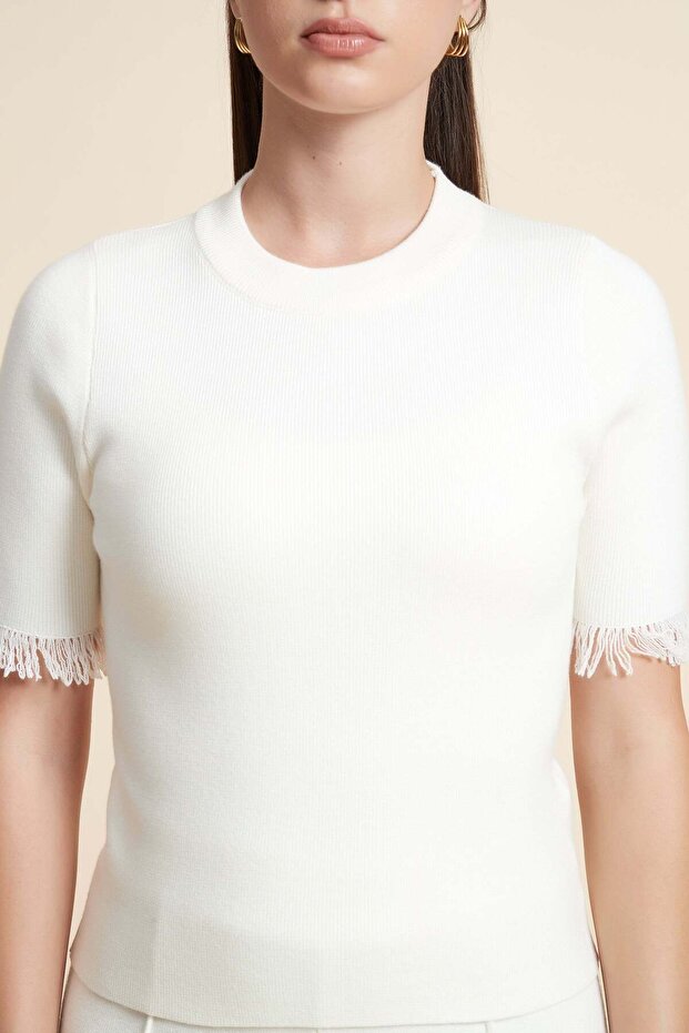 بلوزة قصيرة بلون موحد - 5