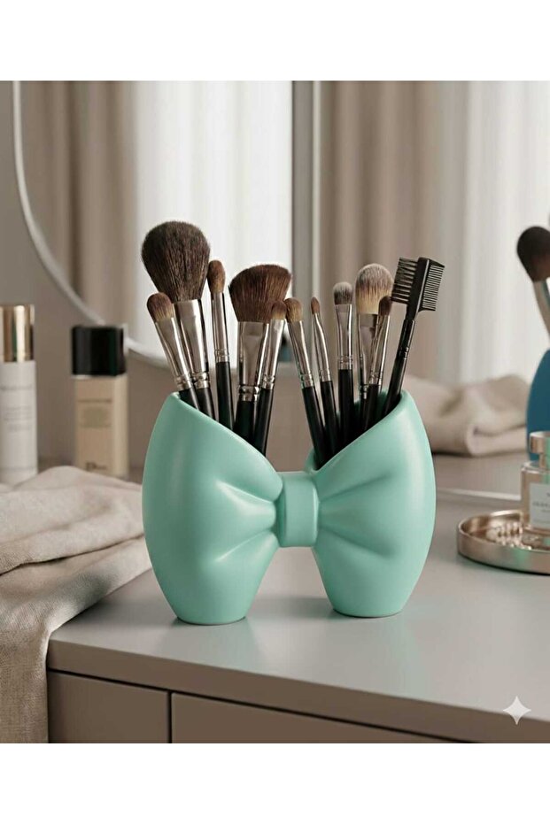 علبة مكياج على شكل فيونكة من ميشينج - 1