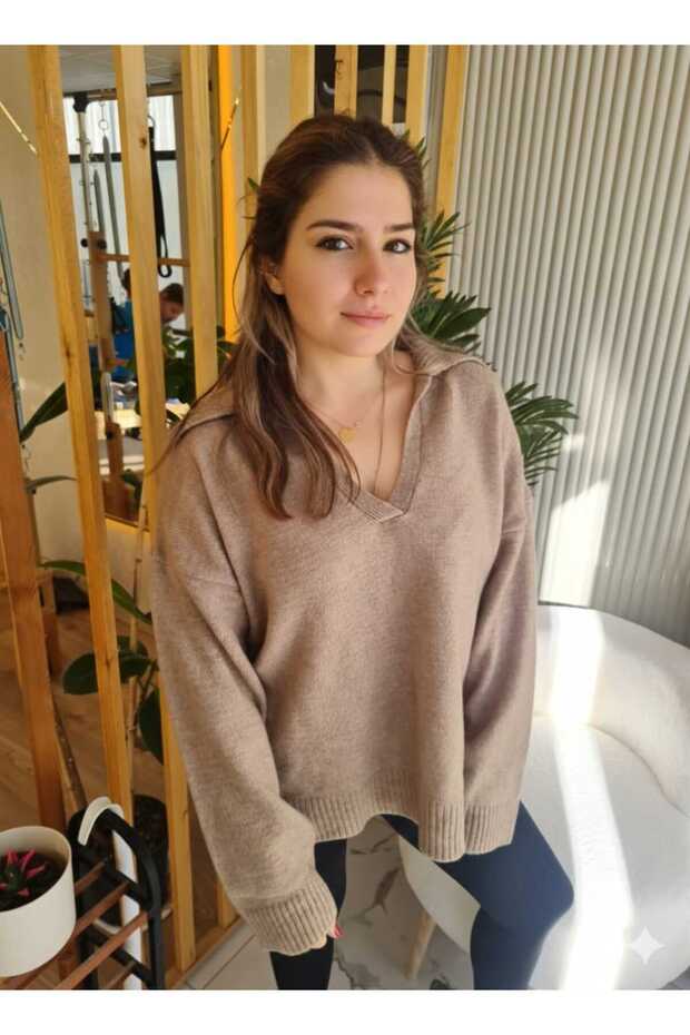 ملابس تريكو بياقة من فرو المنك