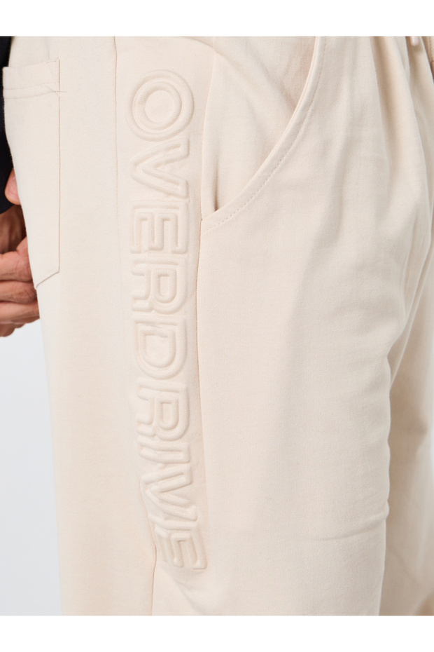 بنطال رياضي رجالي بيج سادة منقوش - 3