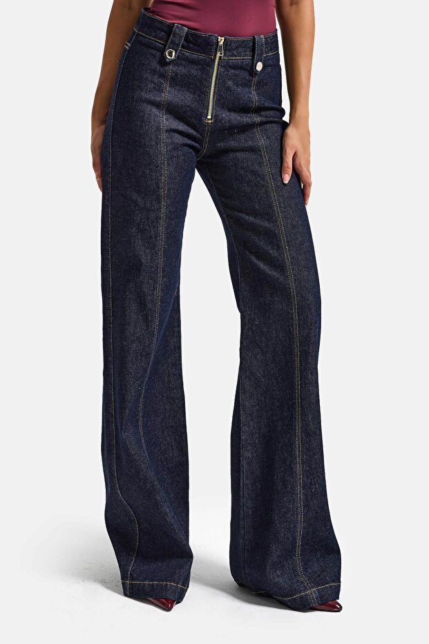 جينز نسائي من قماش الدينيم الإيلاستاني بتفاصيل حزام وسحاب من نوع Indigo 7s6-50 Flare Fit
