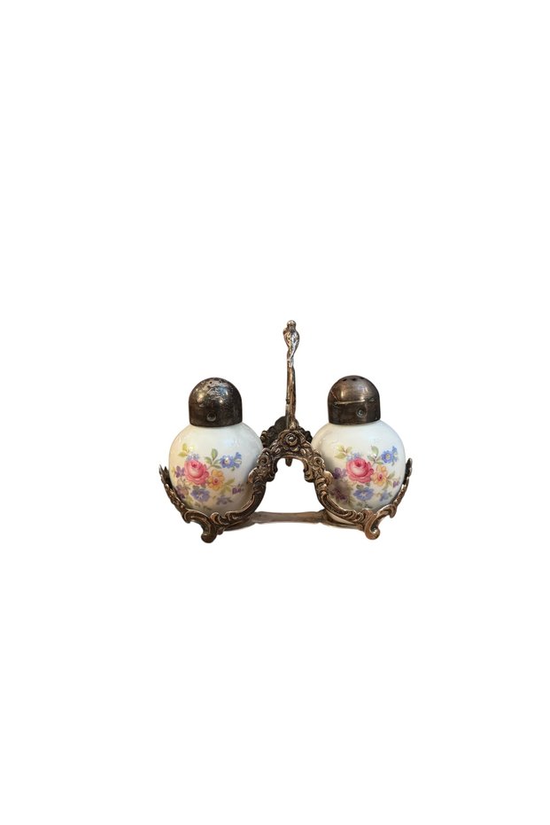 The German Thomas Marka 835 Salt and Pepper Shaker Set, Made of Sterling Silver and Porcelain, Has 43 Grams of Silver.