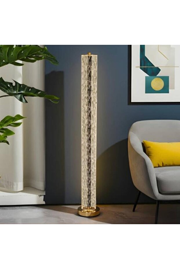 LED floor lamp with a gold base and a three-light switch