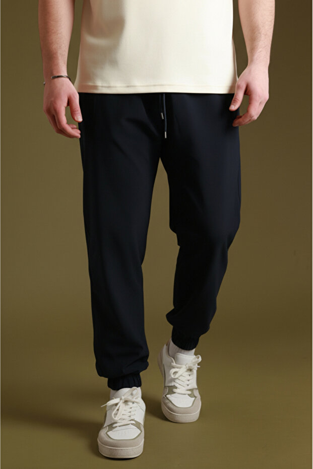 Men's Navy Blue Parachute Fabric Sweatpants | Sports Model with Elastic Cuffs, Zipper and Back Pocket