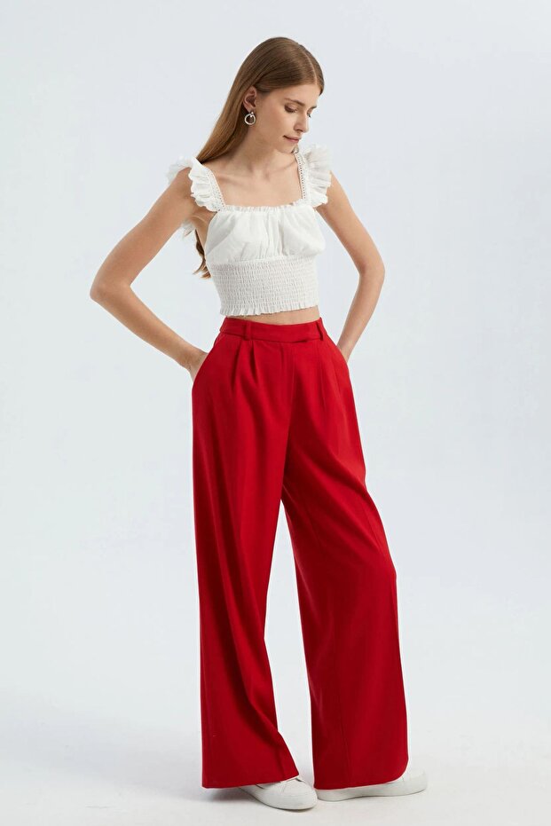 Sleeveless White Top with Drawstring Detail
