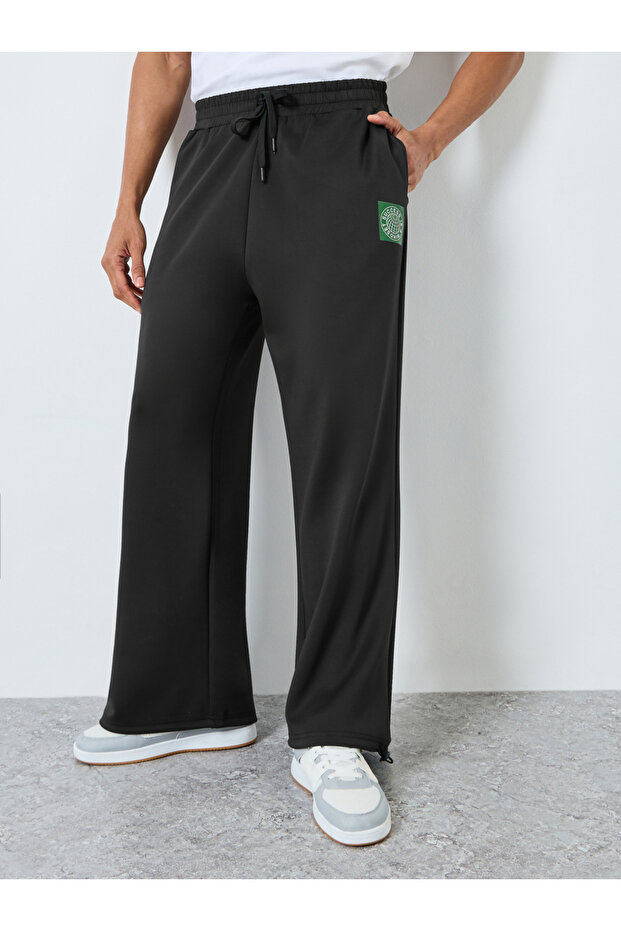 Men Black Wide Leg Scuba Joggers with Patch