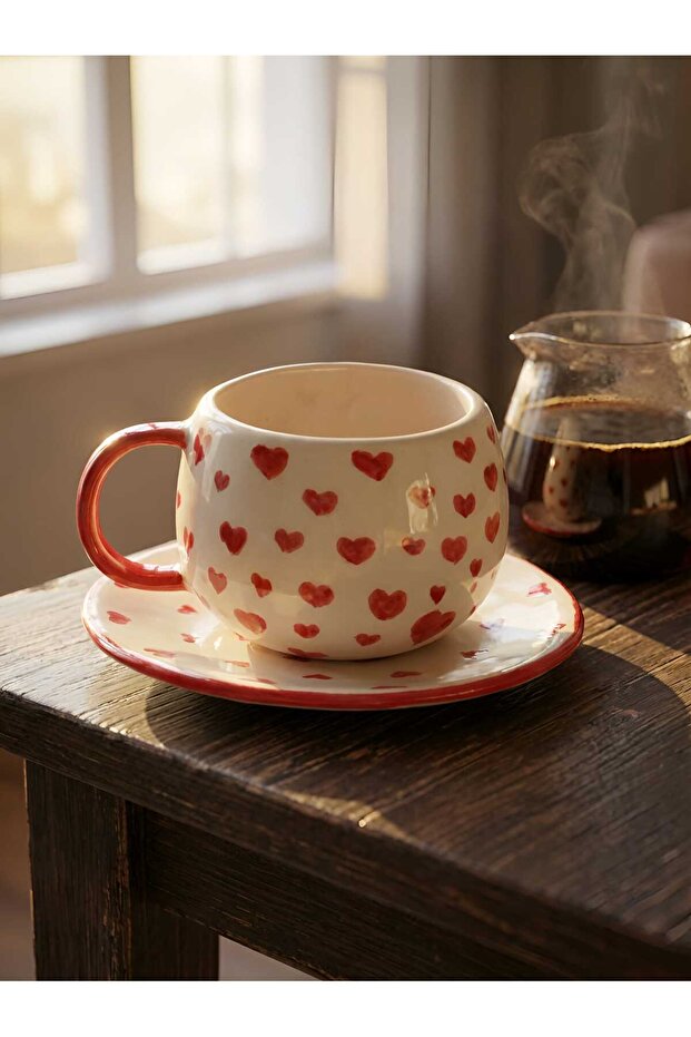 كوب قهوة بنقشة قلب - 1