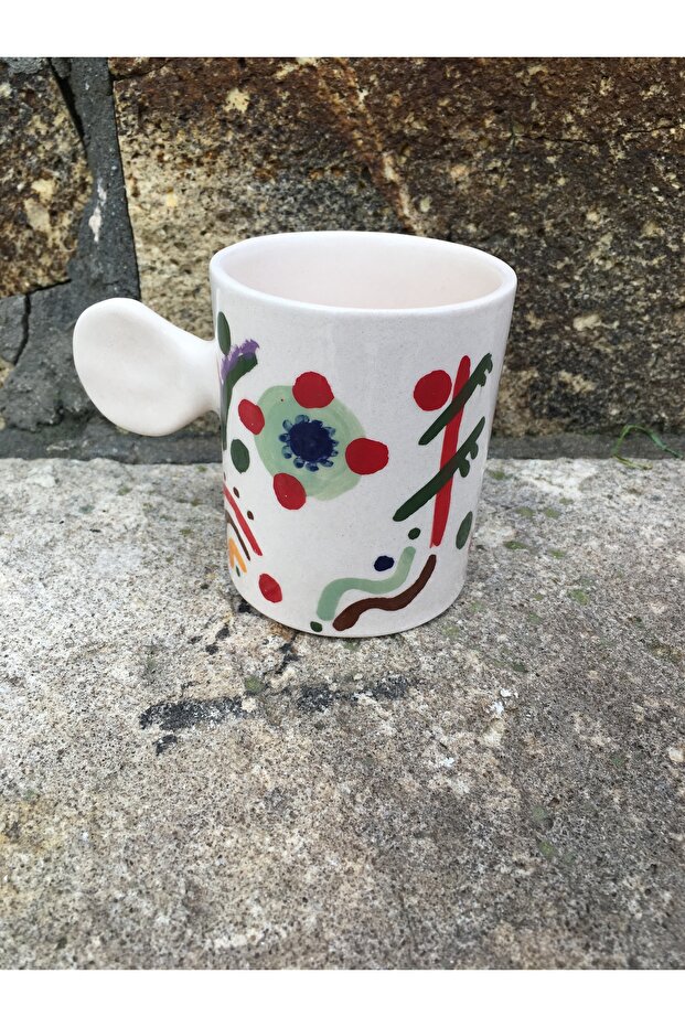 فنجان قهوة مصنوع يدويًا من السيراميك بنقوش مميزة - 1