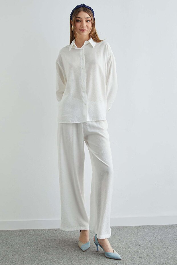 طقم مكون من قطعتين بتصميم كاجوال مع أزرار أساسية وتجاعيد - 6