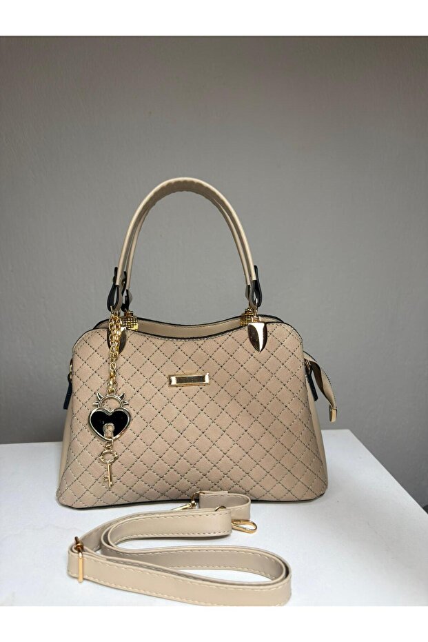 Women's Quilted Hand and Shoulder Bag with Gold Heart Key Accessory and Adjustable Strap