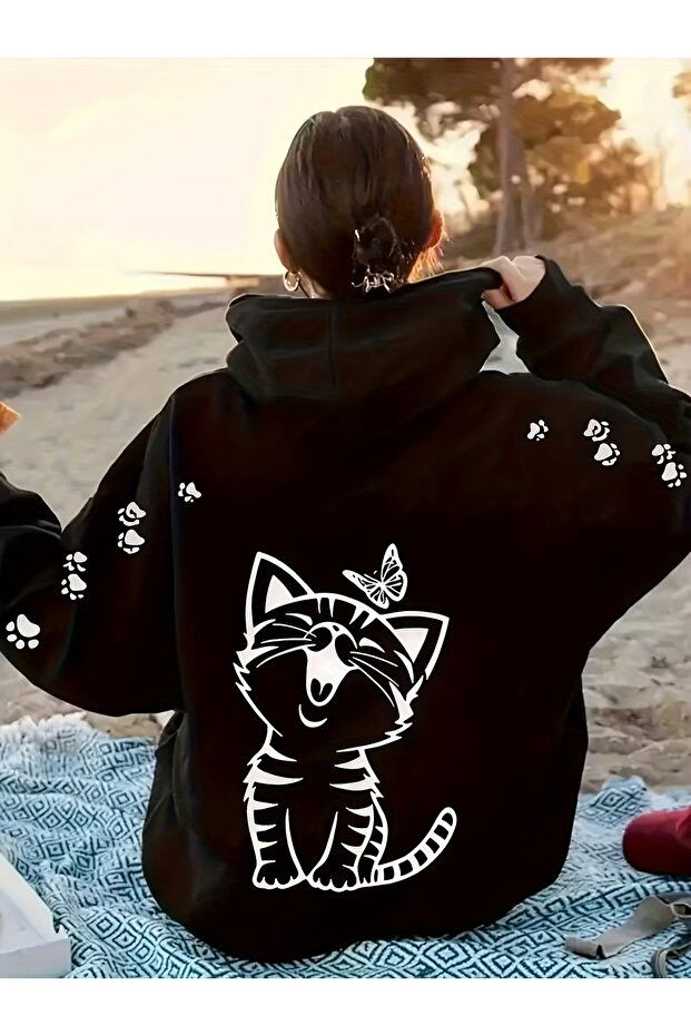 Women's Black and White Hooded Sweatshirt with Cat Paw Pattern and Printed Pockets for Casual Winter Wear