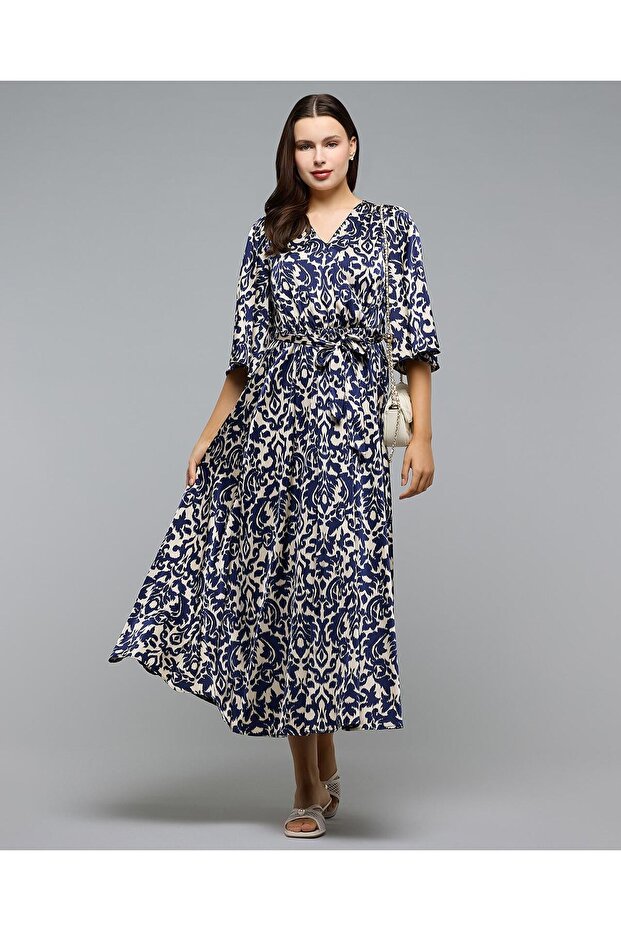 Patterned Maxi Dress with V-Neck and Flutter Sleeves