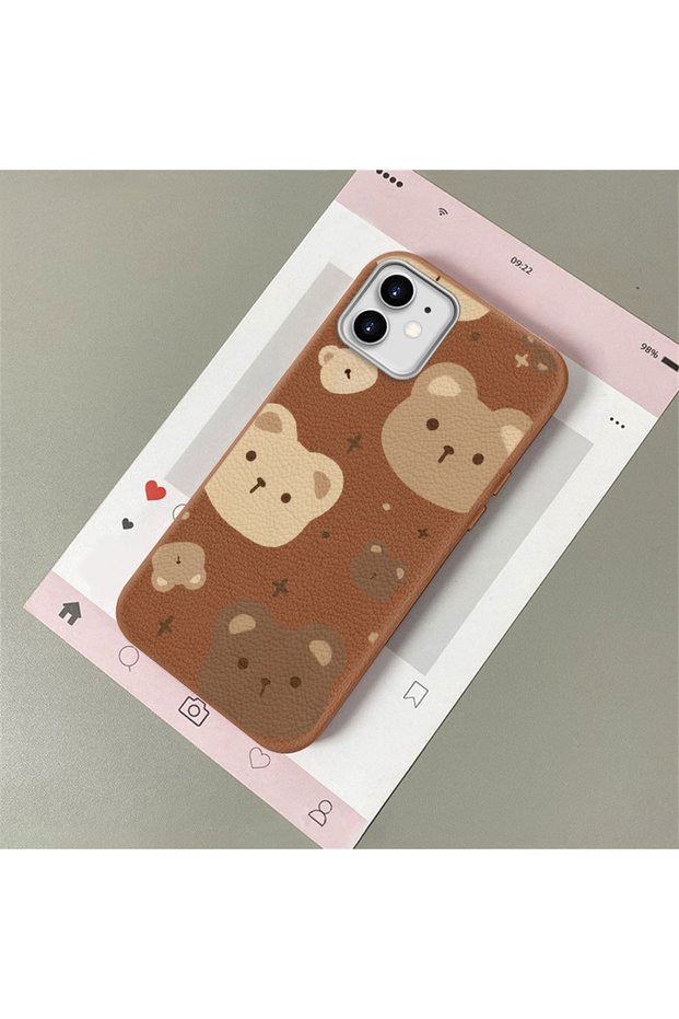 iPhone 11 Compatible, Stylish Phone Case with Cute Teddy Bear Pattern and Leather Texture.