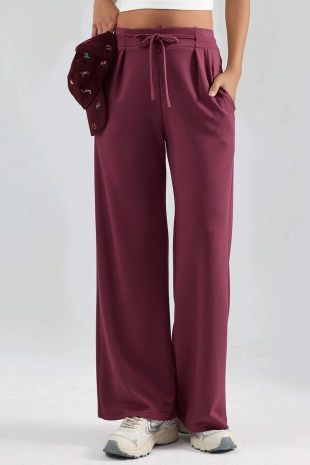 مجموعة مودال ديكستيدد بليسيد بنطلون واسع الأرجل بيرشان