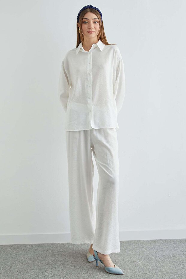 طقم مكون من قطعتين بتصميم كاجوال مع أزرار أساسية وتجاعيد - 1