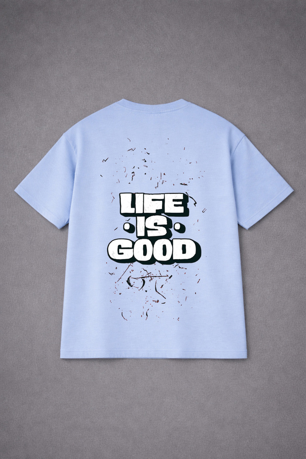 تي شيرت قصة فضفاضة للجنسين 100% قطن بقصة مريحة مطبوع عليه LIFE IS GOOD