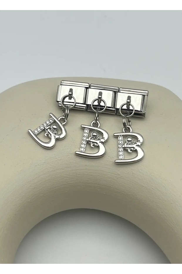 Steel silver dangling nomi letter charm - 25crm37