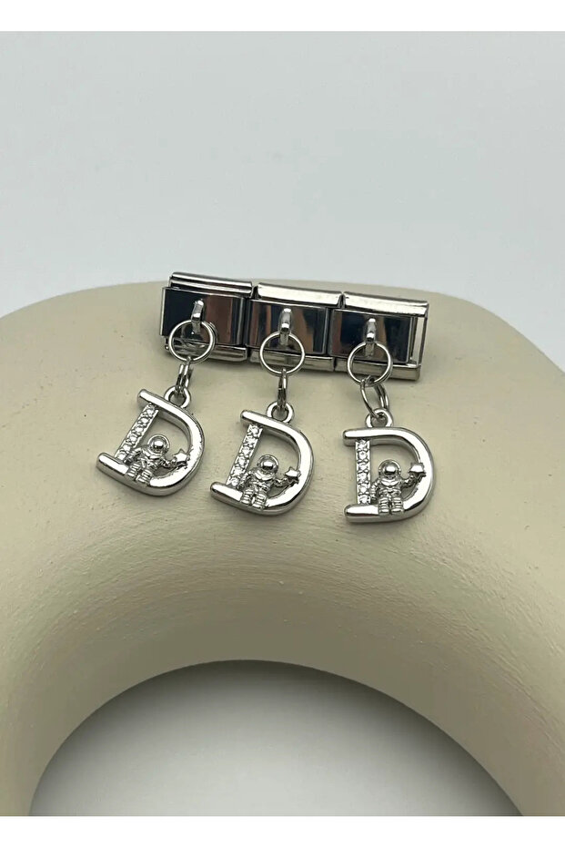 Steel silver dangling nomi letter charm - 25crm37