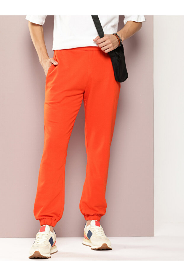 Men Orange Solid Joggers - 1