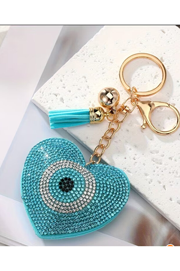 Turquoise blue heart model evil eye keychain or bag ornament.