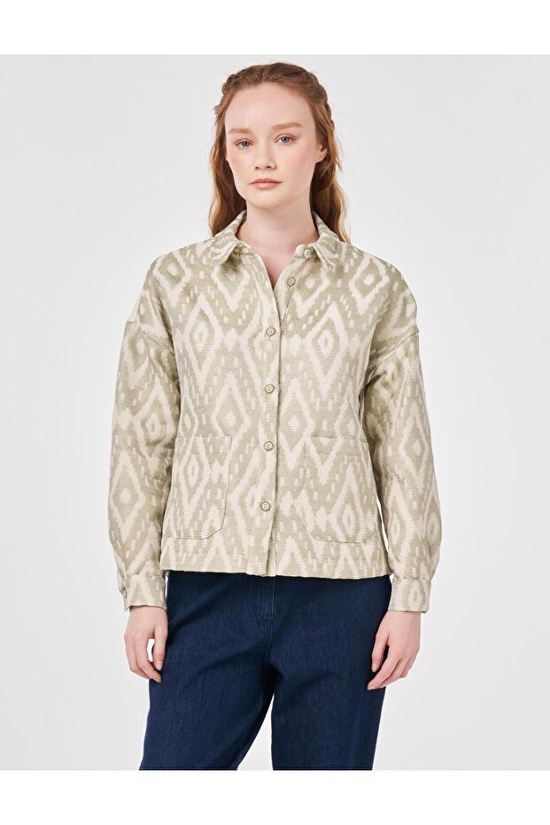 سترة بنمط هندسي باللون الأخضر الفاتح - 1