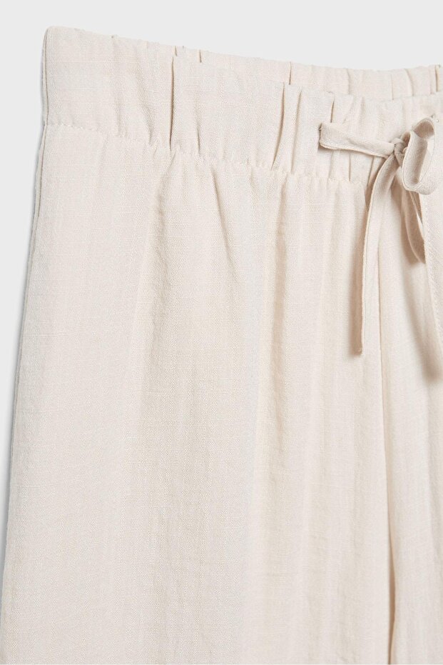 بنطلون واسع مزين بشرابات - 8