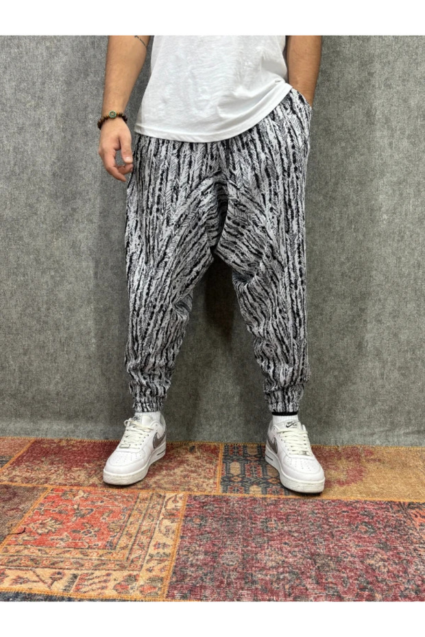 بنطلون شالوار منقوش بخصر مطاطي - 1