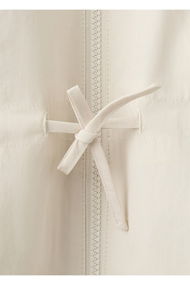 Rubberised jacket with bow - 5