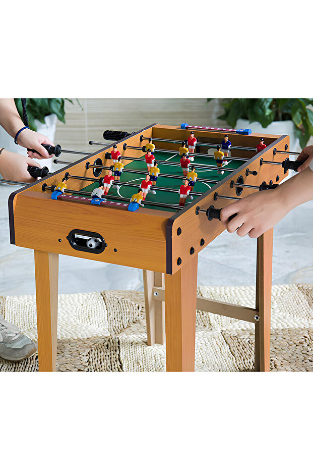 Wooden footed foosball game