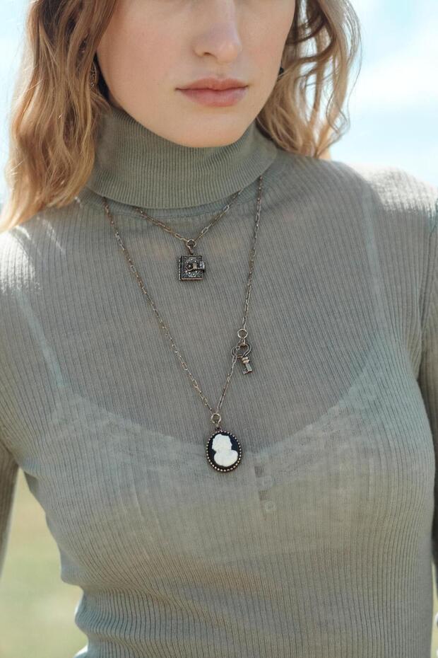 قلادة متعددة الكتب والقلائد السحرية - 1