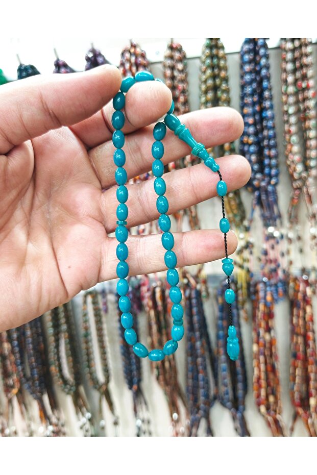 سبحة موديل حلقي من خرز العنبر المقطوع يدويًا بحرفية عالية