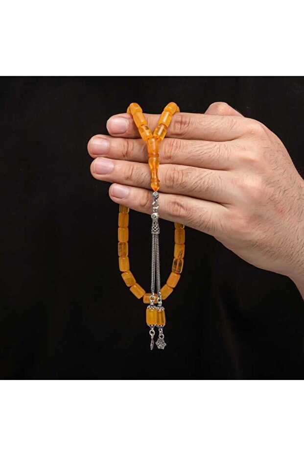 خرز صلاة عنبر مجعد بشرابة فضية