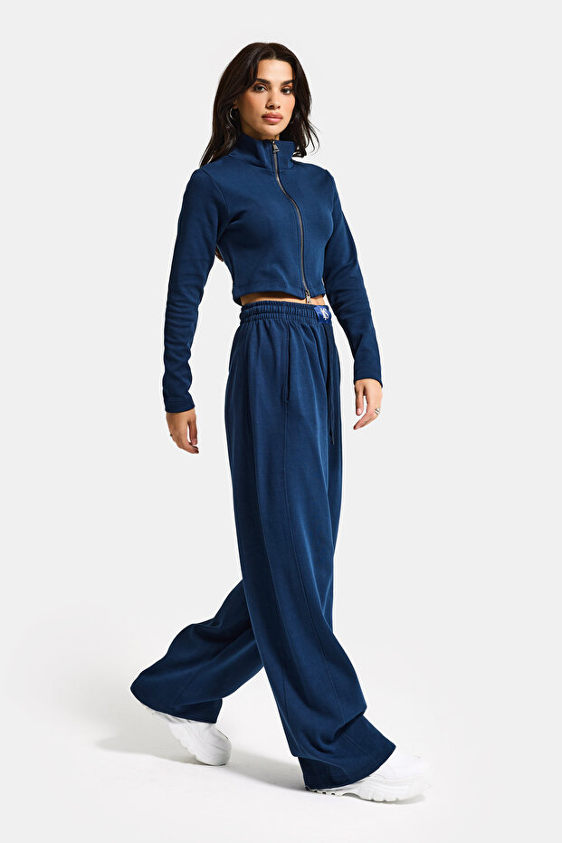 بدلة رياضية نسائية من القماش المحبوك باللون الأزرق الداكن w5-56 وسترة رياضية بسحاب من الأسفل، طقم مكون من قطعتين