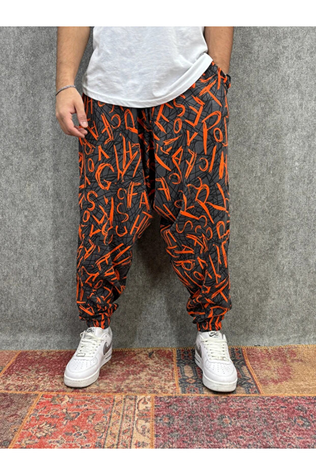 بنطلون شالوار منقوش بخصر مطاطي - 1