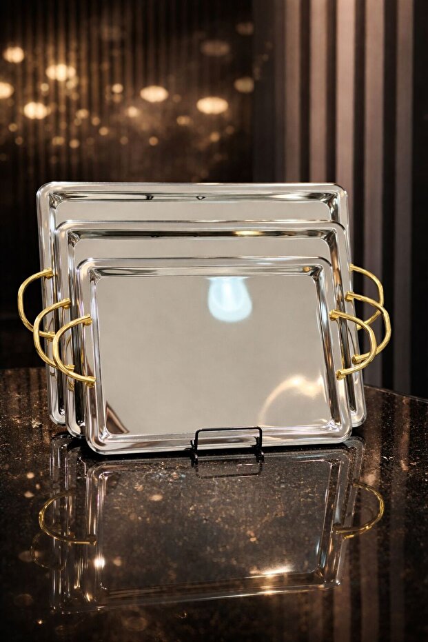 ​طقم صواني تقديم مستطيلة بلمعة المرآة (3 قطع). ​وصف المنتج: - 1