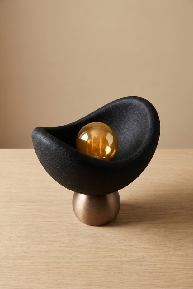 Luna design table lamp with black and bronze accents, soft amber light, rustic bulb included, 20 x 37 cm