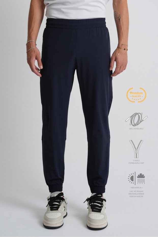 Navy Blue Elastic Cuffs, Lace-Up Waist, Zippered Pockets, Standard Fit Men's Sweatpants
