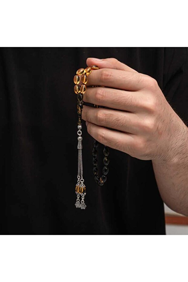 خرز صلاة عنبر مجعد بشرابة فضية