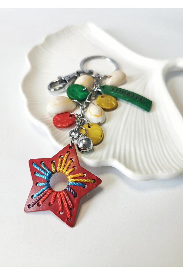 Red star figured keychain charm with turkish writing
