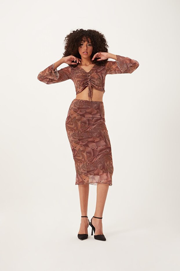 طقم نسائي من القماش الشبكي باللون البني