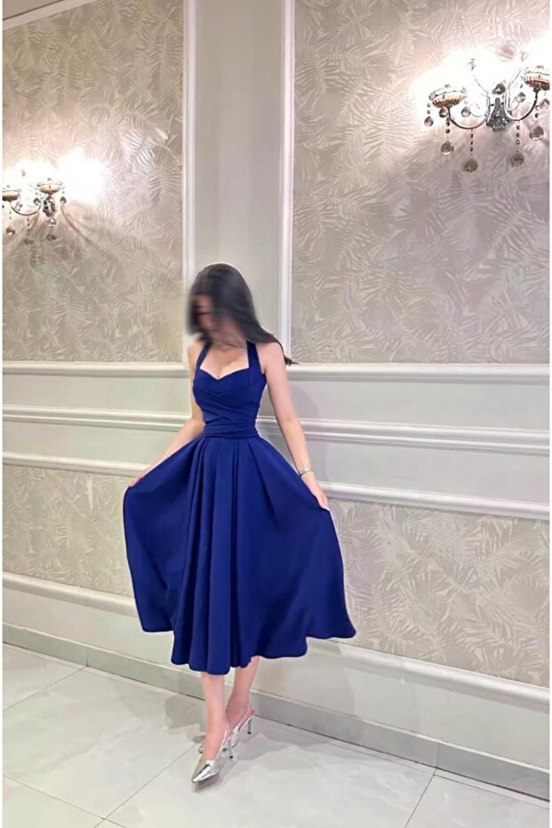 فستان نيلي ميد