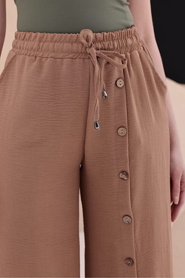 بنطلون كوكونات مزين بأزرار HKN34 - 4