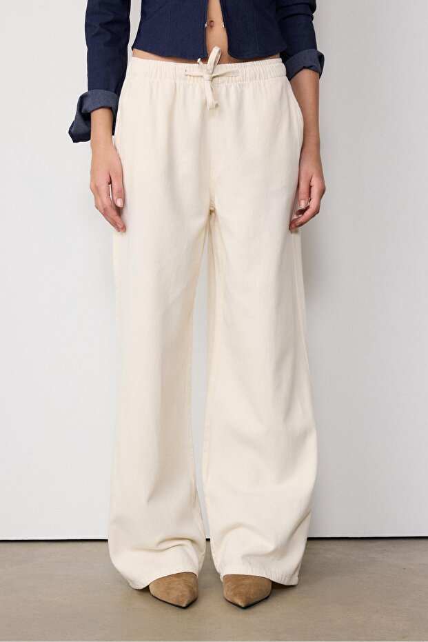 بنطلون دنيم فضفاض برباط - 3