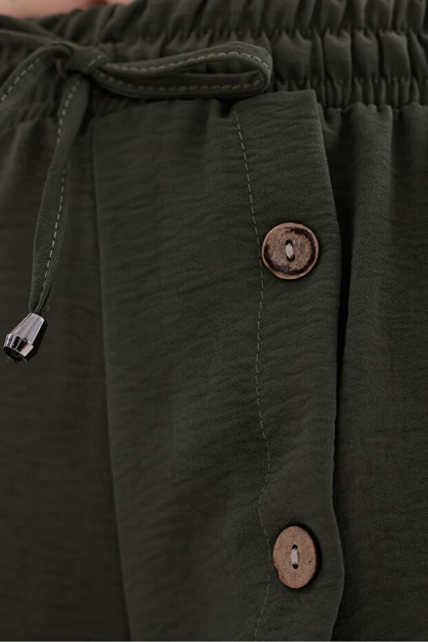 بنطلون كوكونات مزين بأزرار HKN34 - 7