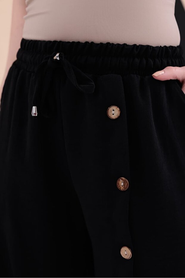 بنطلون كوكونات مزين بأزرار HKN34 - 2