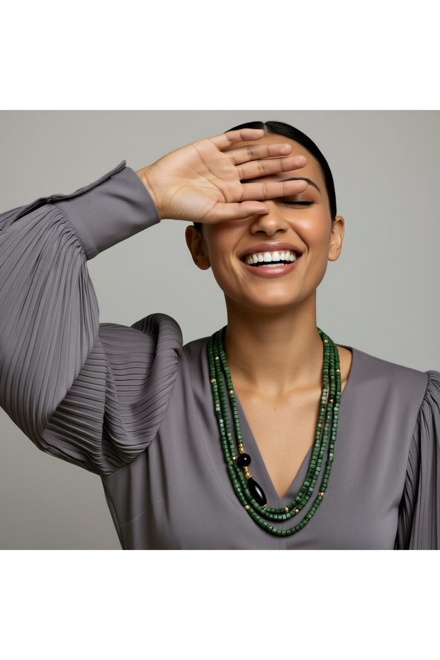 Dark green wooden beaded long necklace with black stones and gold details, multi-layered.