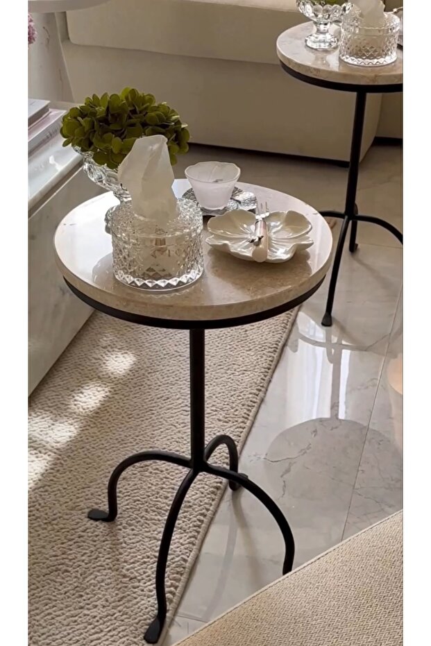 Black iron base serving table with marble top